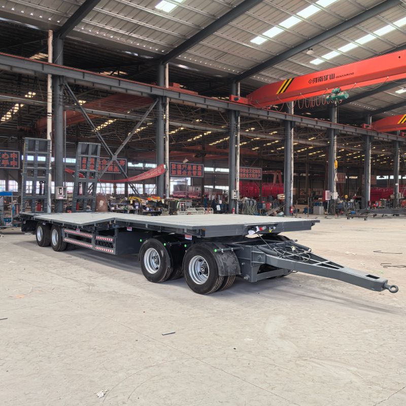 รถพ่วงเตียงต่ำแบบคานลาก รถพ่วงเตียงต่ำแบบคานลาก