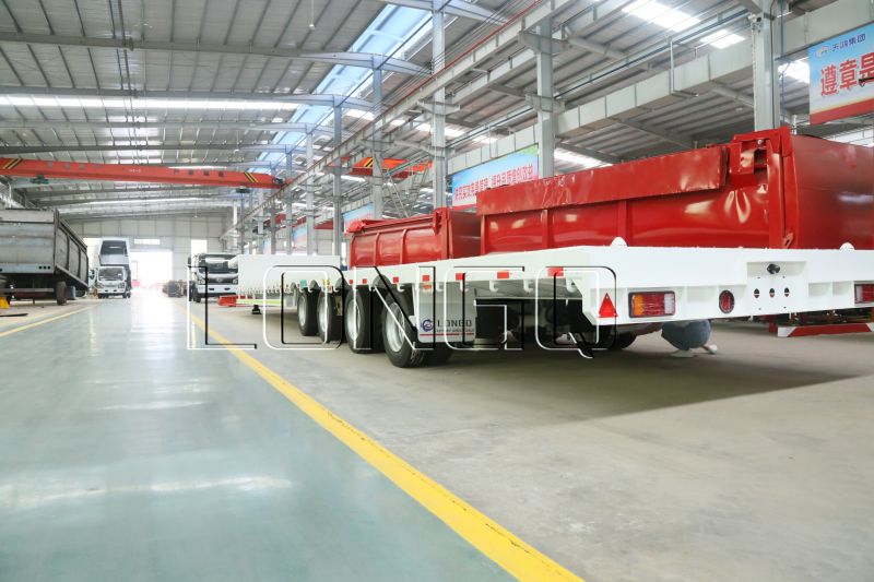 รถพ่วงพื้นต่ำคอห่าน 4 เพลา รถพ่วงพื้นต่ำคอห่าน 4 เพลา