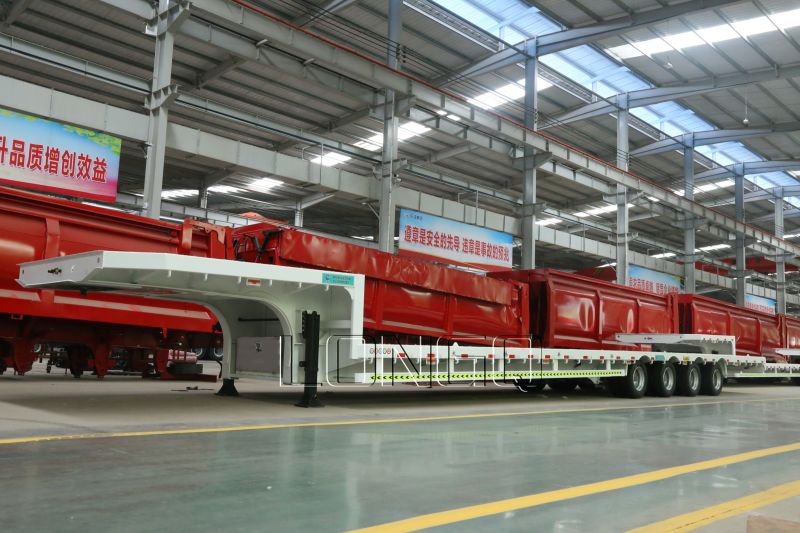 รถพ่วงพื้นต่ำคอห่าน 4 เพลา รถพ่วงพื้นต่ำคอห่าน 4 เพลา