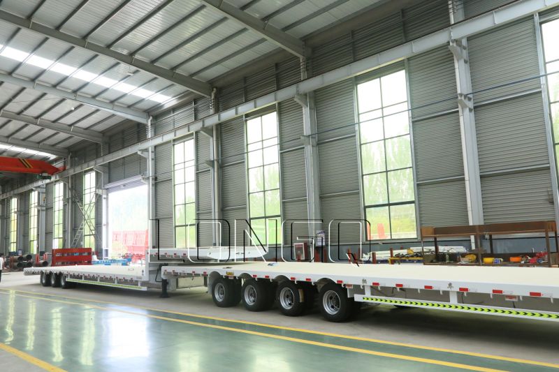 รถพ่วงพื้นต่ำคอห่าน 4 เพลา รถพ่วงพื้นต่ำคอห่าน 4 เพลา